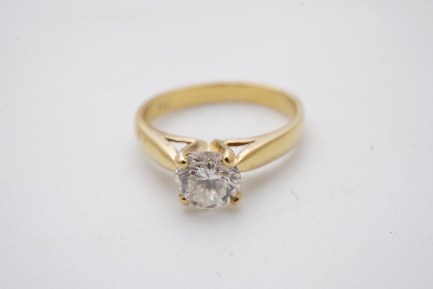 A diamond solitaire ring